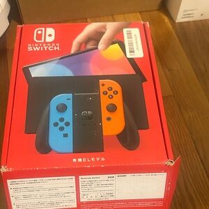 Nintendo Switch Console - Blue and Orange Joy-Con